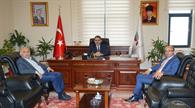 Fikri Demirel ve Dr. Metin Oral’dan Rektörümüze Ziyaret 
